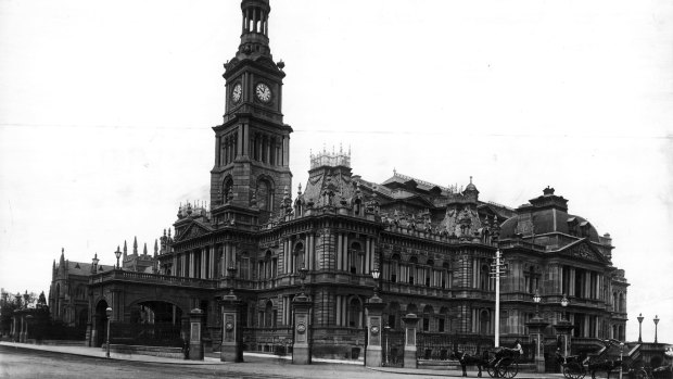 The exterior of Sydney Town Hall in 1892 as viewed from the corner of George and Park Streets. 