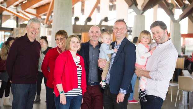 ACT Chief Minister Andrew Barr spends some time with his family at the aboretum: From left parents James and Susan Barr, sister-in-law Natalie Barr, partner Anthony Toms, Andrew Barr with nephew Angus, and brother Iain Barr with Zoe.