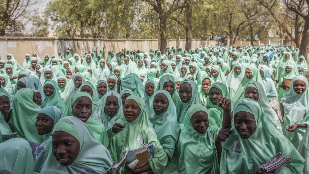 Hundreds of school girls leave the Women's Teachers College Secondary School at the end of a school day in Maiduguri, Nigeria.