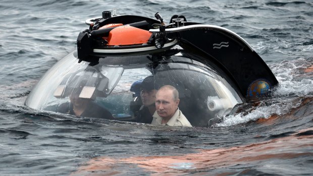 Russian President Vladimir Putin aboard a bathyscaphe as it plunges into the Black Sea along the coast of Sevastopol, Crimea, on Tuesday.