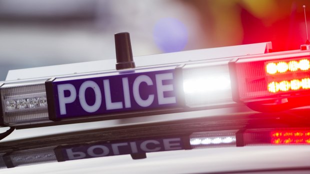 A man on bail was found with a knife and a steel post at a northside shopping centre. 