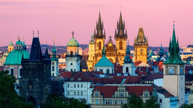 Skyline of Prague at dusk.