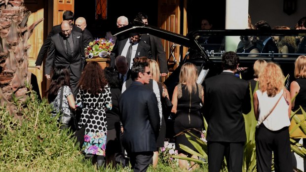 The coffin of Tina Kontozis is carried out of the Saint Styliano's Greek Orthodox Church in Gymea.