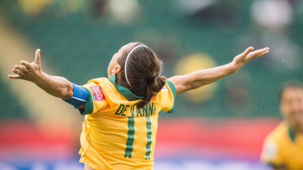 Matildas captain Lisa de Vanna (right) celebrates her early goal against Sweden in Edmonto