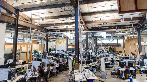 Employees inside Facebook's Menlo Park, California, office, which may be the longest continuous workspace in the world. 