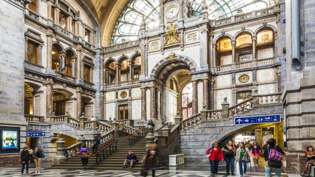 The grand waiting and entrance hall of the Antwerpen Centraal railway station designed by Louis Delacenserie. 