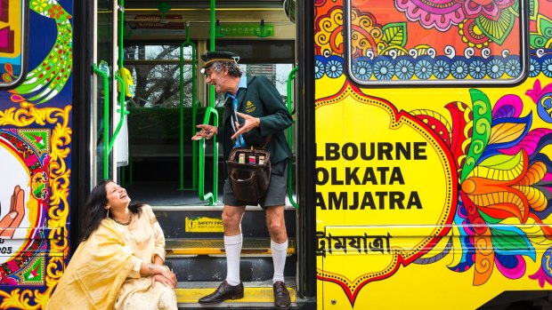 Artist Bushra Hasan and former tram conductor Roberto D'Andrea with Melbourne's new art tram. 