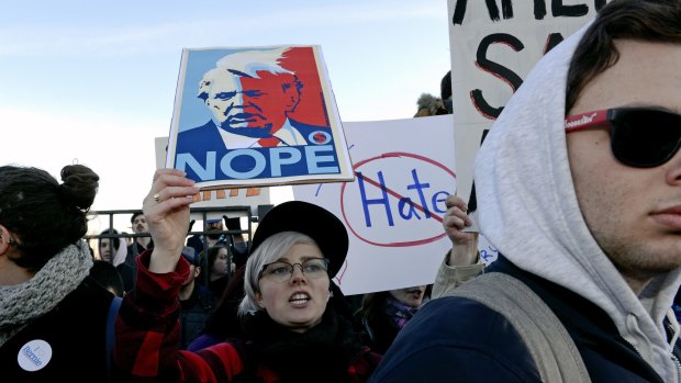 Protesters march in Chicago before a rally with Republican presidential candidate Donald Trump.