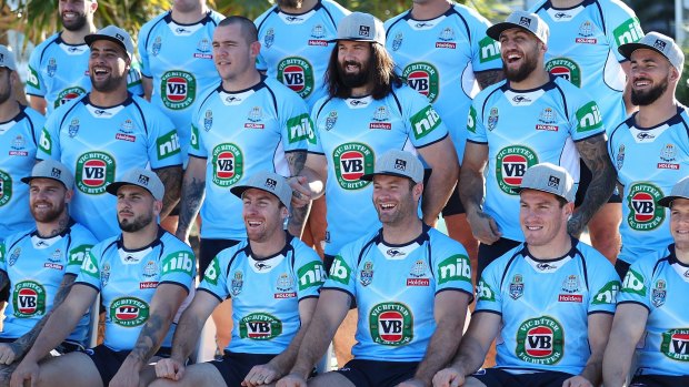 Hat trick: NSW Blues players pose for the team photo wearing their RLPA hats.