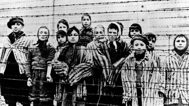 A group of children in Auschwitz, pictured shortly after the camp's liberation by the Soviet army in 1945.