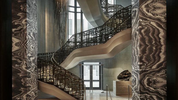 The showstopper metallic staircase and Italian marble.