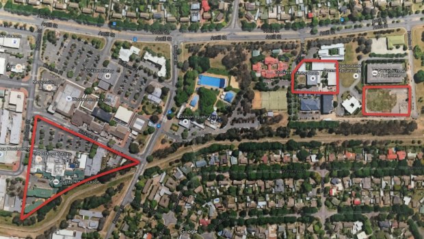 Land owned by Tradies in Dickson, including the car park they bought from the government. And the two blocks behind the pool which the government bought from the Tradies, including the CFMEU headquarters.  Photo: Supplied

