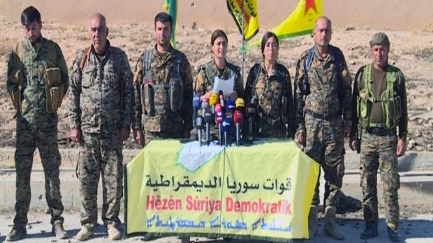 The US has backed Kurdish forces in Syria, seen here giving a press conference.