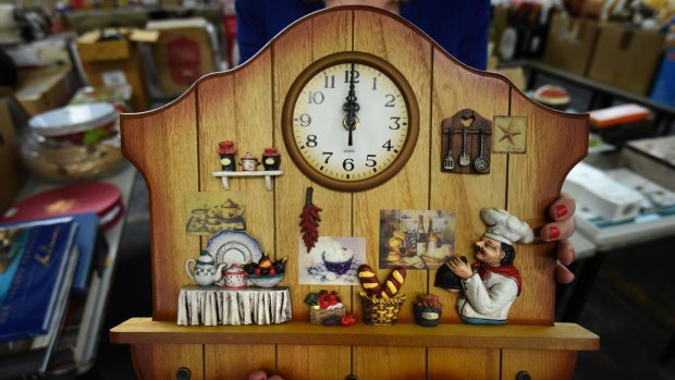 An unclaimed ornamental clock is up for auction.