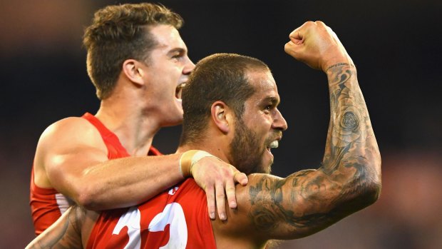 Eyes on the prize: Lance Franklin and Tom Papley during Sydney’s convincing win over Geelong at the MCG on Friday night.