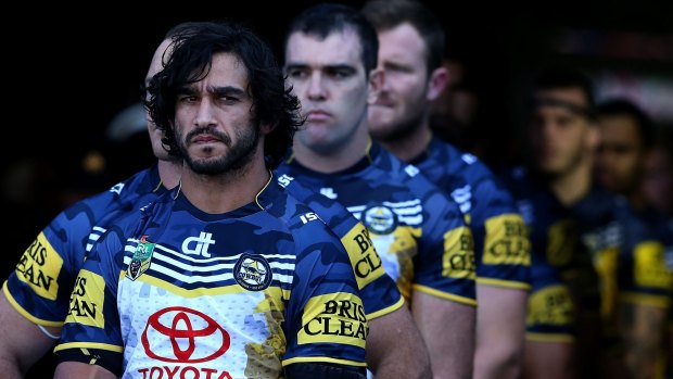 Leader of men: Johnathan Thurston takes the Cowboys out during the round eight NRL match between the Newcastle Knights and the North Queensland Cowboys at Hunter Stadium.