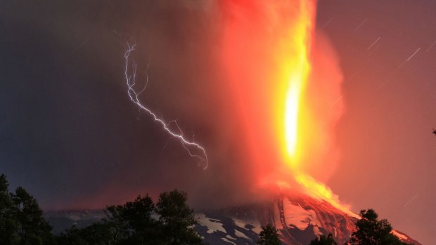 Villarrica volcano in southern Chile erupts, forcing the evacuation of some 3385 people from nearby villages.