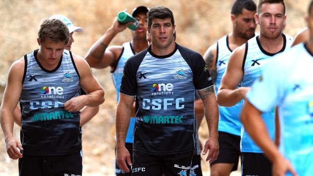 Michael Ennis, centre, turned down a massive offer from the Raiders to join the Sharks.