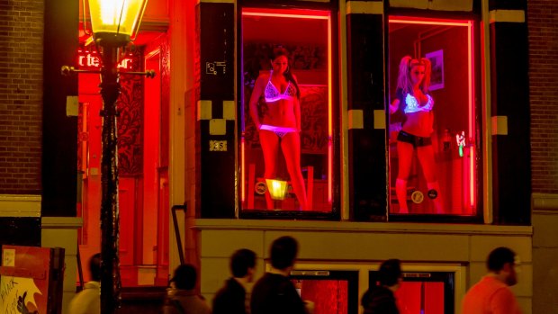 Amsterdam's first female mayor plans to close the curtains of window brothels so sex workers are no longer visible from the street