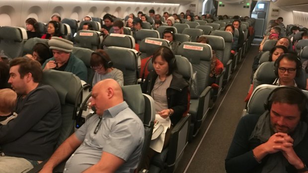Passengers in premium economy during the flight.