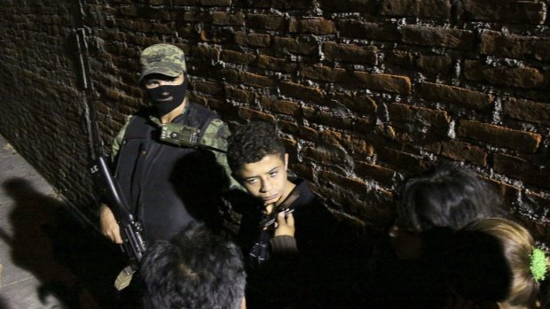 Suspected teenaged hitman Edgar Jimenez Lugo, alias "El Ponchis", in 2010. The recent killing of a six-year-old, apparently by a group of adolescents, has again focused Mexican attention on teenaged killers. 