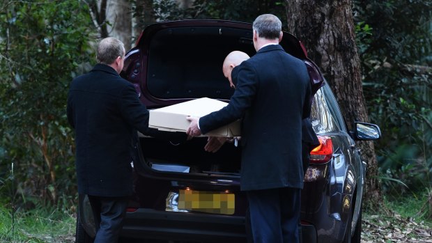 NSW Police detectives remove Matthew Leveson's bones from the Royal National Park.