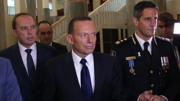 Immigration Minister Peter Dutton, Prime Minister Tony Abbott and Australian Border Force commissioner Roman Quaedvlieg.