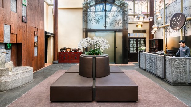 The Amoy's spacious lobby features memorabilia from Singapore's past.
