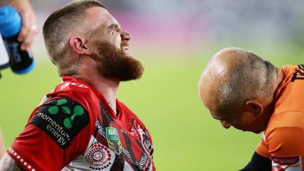 Painful blow: Josh Dugan shows discomfort after suffering an arm injury during the round 11 NRL match between the South Sydney Rabbitohs and the St George Illawarra Dragons at ANZ Stadium on May 19.