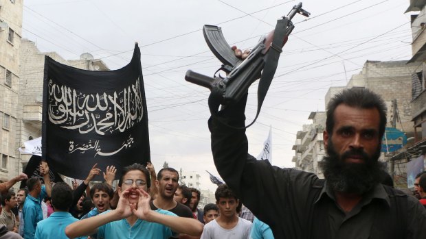 Nusra Front supporters take part in a protest in Syria: 