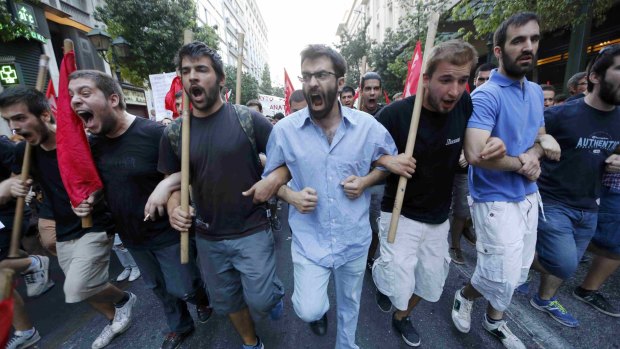 Anti-Euro protesters attend an anti-austerity rally in central Athens, Greece on July 10.