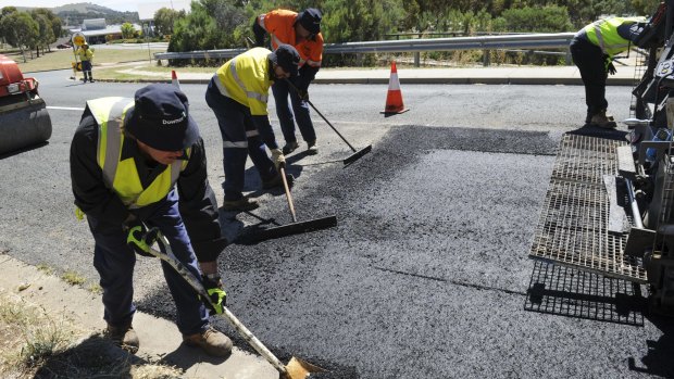 Roads ACT is trialling a carbon-reduced asphalt mix, using recycled toner cartridge powder.