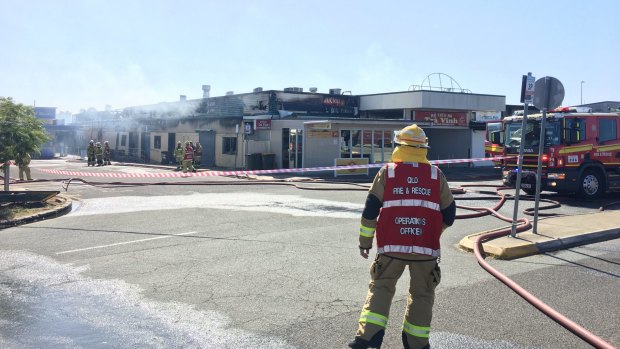 Fire crews battled a large blaze at Inala's Civic Centre on Saturday morning. 