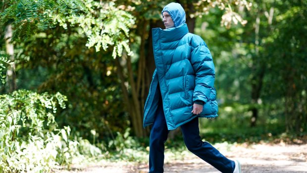 Is this man hiking in the Bavarian forest? No, he's on his way to the Balenciaga show at Paris Fashion Week.