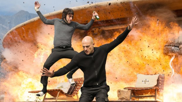 Mark Strong (right) as Agent Sebastian Butcher and Sacha Baron Cohen as Carl 'Nobby' Butcher in <i>Grimsby</i>.