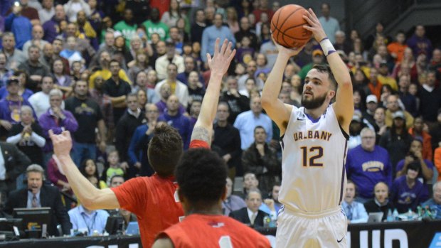 What a story: Albany's Peter Hooley hits the game winning shot. 