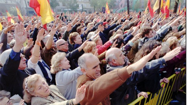 Right-wing Spaniards make the fascist salute at a rally in Madrid in 1995 as they commemorate the 20th anniversary of the death of Spain's dictator Francisco Franco.