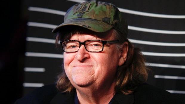 Michael Moore has hit back at Donald Trump, after the US president criticised his play on Twitter.