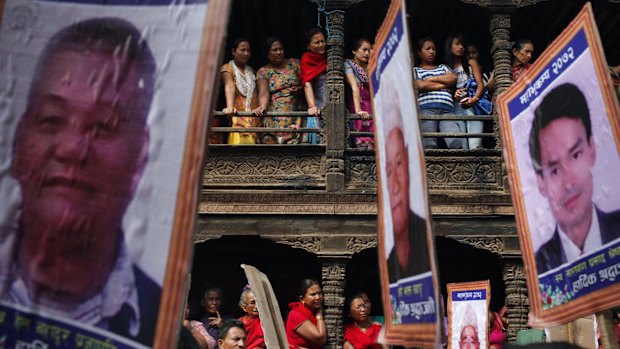 A rally pays tribute to earthquake victims in Bhaktapur on Wednesday.