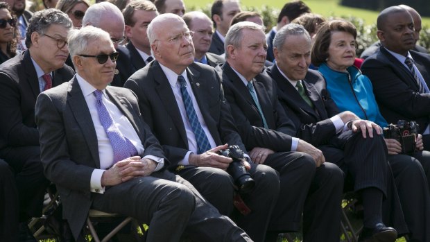 Democratic Senators, from left, Harry Reid of Nevada, Patrick Leahy of Vermont, Richard Durbin of Illinois, Charles Schumer of New York and Dianne Feinstein of California at the White House as US President Barack Obama announces his nomination for the Supreme Court. 