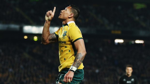 Israel Folau celebrates a try against the All Blacks in Auckland this year.