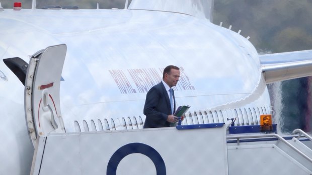 Prime Minister Tony Abbott arrives in Canberra for a cabinet meeting on Tuesday.