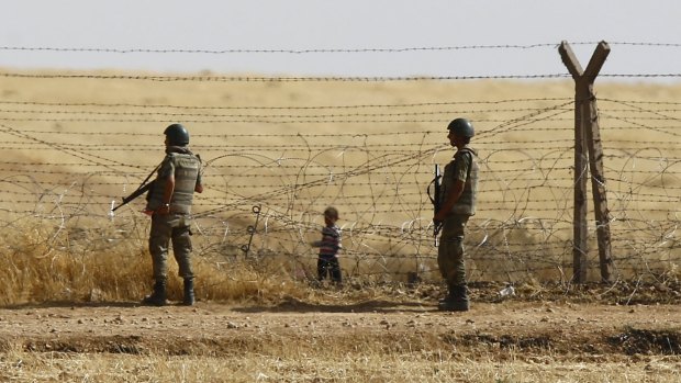 The security fence on the Turkish-Syrian border, near the south-eastern town of Akcakale in Turkey's Sanliurfa province. 