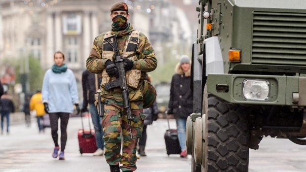A Belgian soldier on patrol in the centre of Brussels.
