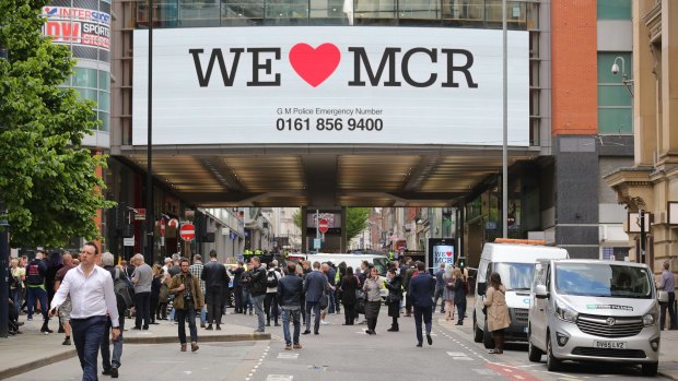 Crowds in Manchester after the Arndale Shopping Centre, a stone's throw from Manchester Arena, was evacuated on Tuesday.