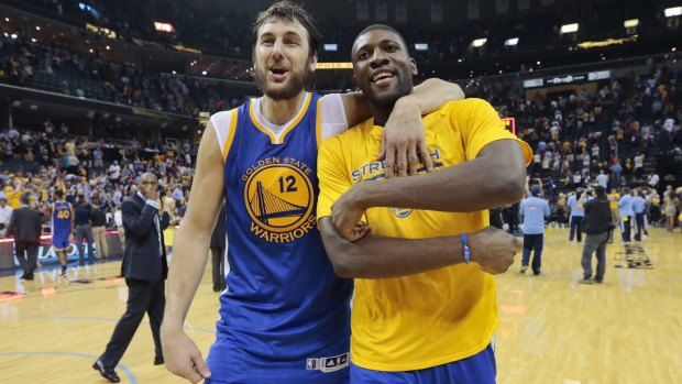 Onward and upward: Golden State Warriors centres Andrew Bogutand Festus Ezeli after they beat the Memphis Grizzlies in Game 6.