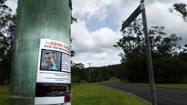 A poster on a telegraph pole at the start of Benaroon Drive, Kendall asking for information about missing toddler William Tyrrell.