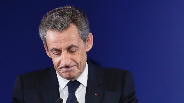 Former French President Nicolas Sarkozy delivers a speech after his defeat in the first round of the French 'Les Republicains' primaries in Paris on Sunday.