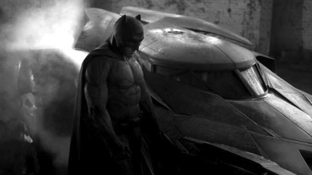Ben Affleck in costume as Batman for 2016 film <i>Batman v Superman: Dawn of Justice</i>.