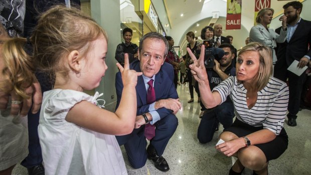 Bill Shorten meets two-year-old Isabella Roberts at Morayfield Shopping Centre.